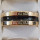 Stainless steel ring, gold-black