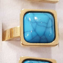 Stainless steel ring, synth. turquoise, gold