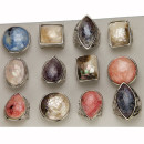 Assortment mother-of-pearl rings, coloured