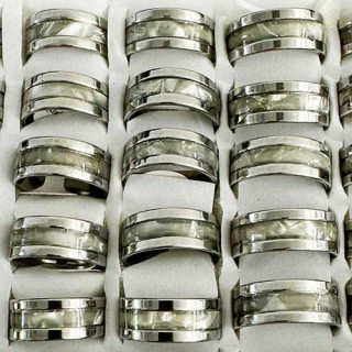 Stainless steel ring with shell