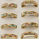 Stainless steel ring with colored stones, gold
